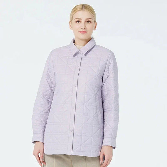 Fashionable women's quilted cotton jacket in beige with functional pockets and chic zippers for a sophisticated, casual look
