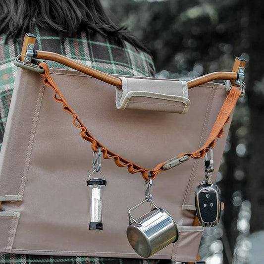 Adjustable camping strap with multi-ring design for organising outdoor gear and supplies