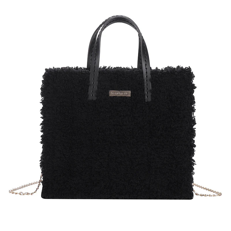 A premium hand-woven tote bag in a stylish design, featuring a magnetic closure and an adjustable shoulder strap for versatile use.