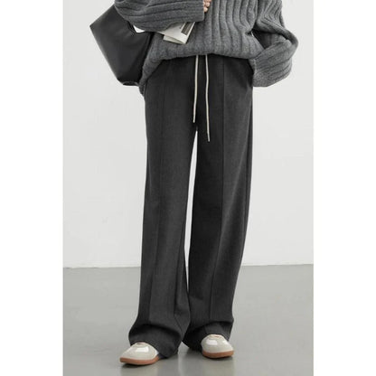 Premium high-waisted striped wide-leg trousers for stylish women, featuring a pleated front and brushed fabric for comfort