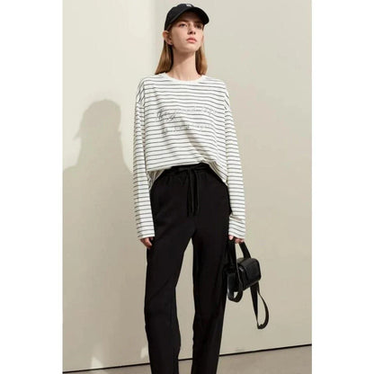Premium casual striped cotton t-shirt with patchwork detail, offering a stylish and comfortable everyday essential