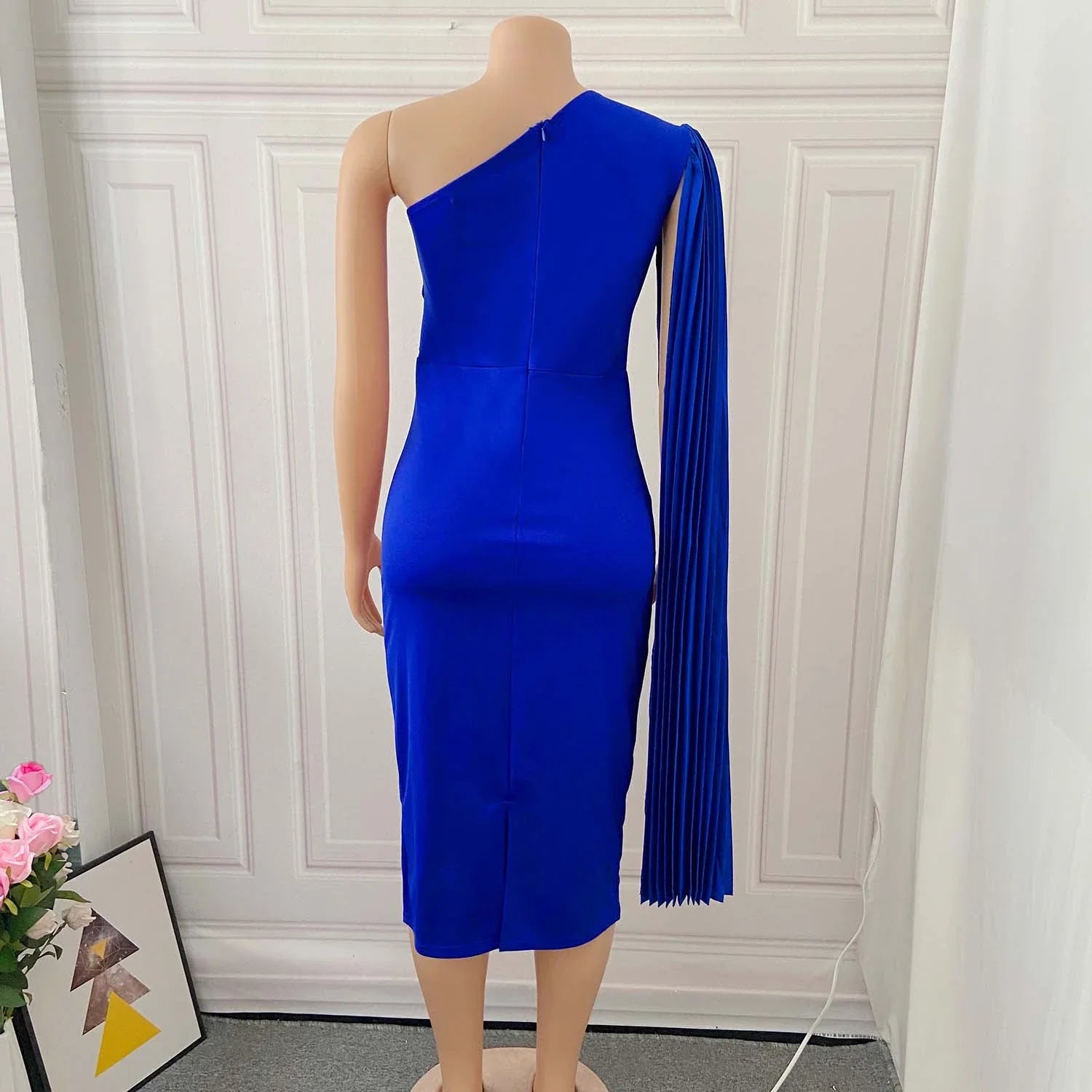 Sophisticated one-shoulder plus size evening dress with an alluring asymmetric neckline and figure-flattering silhouette