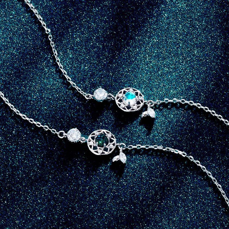 Enchanting sterling silver bracelet with genuine moonstone and celestial motifs
