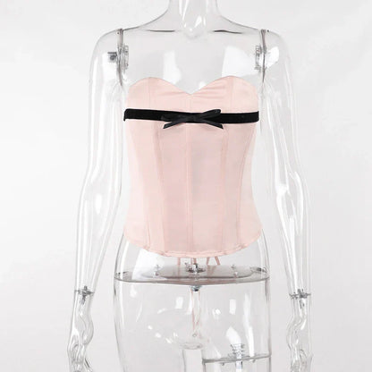 Stylish bow-accented waist back fashion in pink, made with premium polyester for a comfortable and flattering fit.