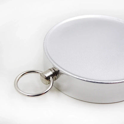 Compact aluminium compass keychain with tempered glass surface and bright compass face, perfect for outdoor adventures in the UK