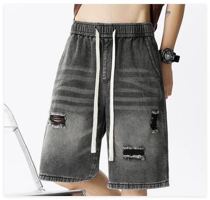 Premium British-crafted vintage-inspired ripped denim shorts for men with a straight-leg silhouette and authentic distressed details