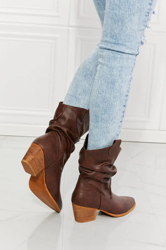Stylish scrunch cowboy boots in a rich brown colour, perfect for pairing with jeans or dresses for a touch of rustic charm.