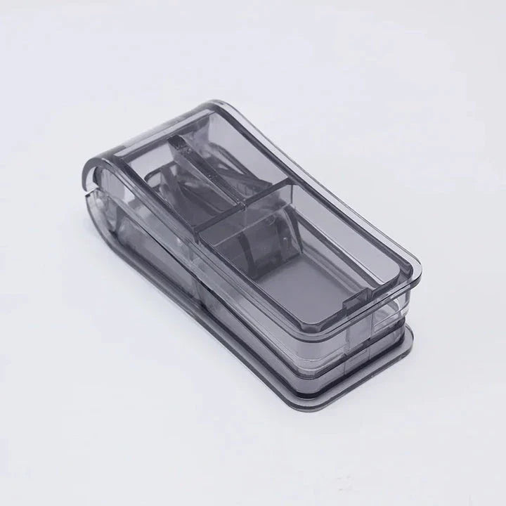 Compact Pill Splitter and Storage Organizer with Orange Colour, Featuring Precision Cutting Blade and Built-in Storage Compartment