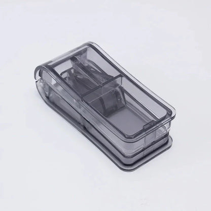 Compact Pill Splitter and Storage Organizer with Orange Colour, Featuring Precision Cutting Blade and Built-in Storage Compartment