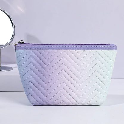 Elegant gradient-coloured makeup bag made of premium PU leather, perfect for organised storage and travel
