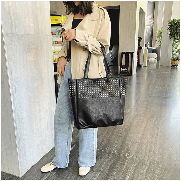 Premium British leather tote bag in black, featuring a large capacity design and stylish, versatile appeal.