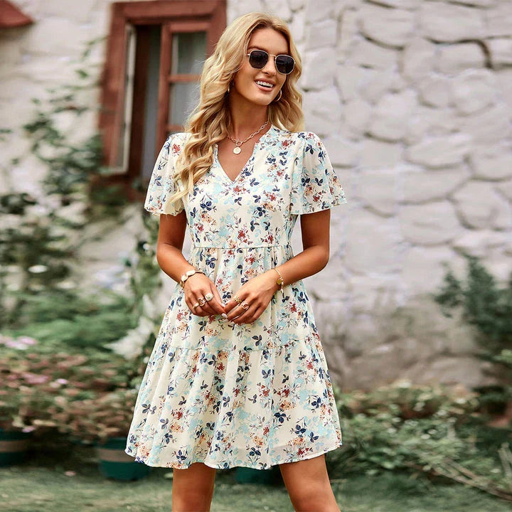 Elegant V-neck chiffon A-line dress with flowing sleeves, available in black for all seasons