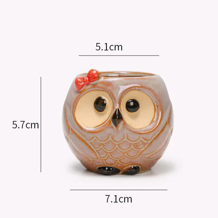 Adorable owl-shaped ceramic flower pot in white, suitable for succulents and small plants
