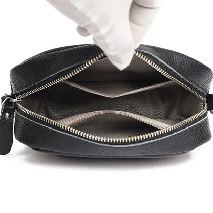 Stylish leather crossbody bag with embroidered strap in various colours