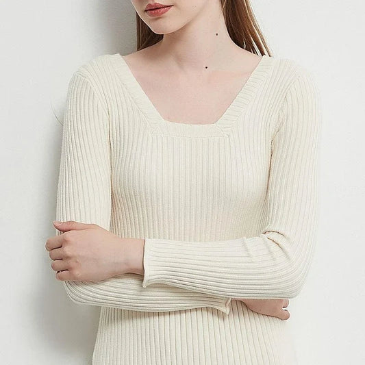 Elegant and cosy midi sweater dress in black, featuring a solid, body-hugging silhouette and comfortable knit fabric