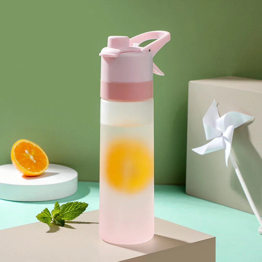 Premium 650ml Portable Spray Water Bottle with Tritan Material and Innovative Spray Function for Outdoor Activities