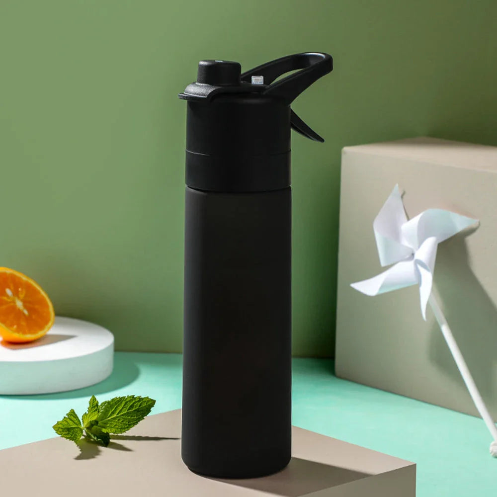 Premium 650ml Portable Spray Water Bottle with Tritan Material and Innovative Spray Function for Outdoor Activities