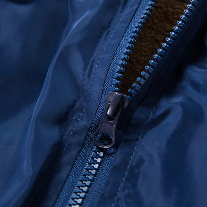 Men's slim-fit hooded jacket with camouflage print, zippered pocket, and premium chemical fibre blend fabric