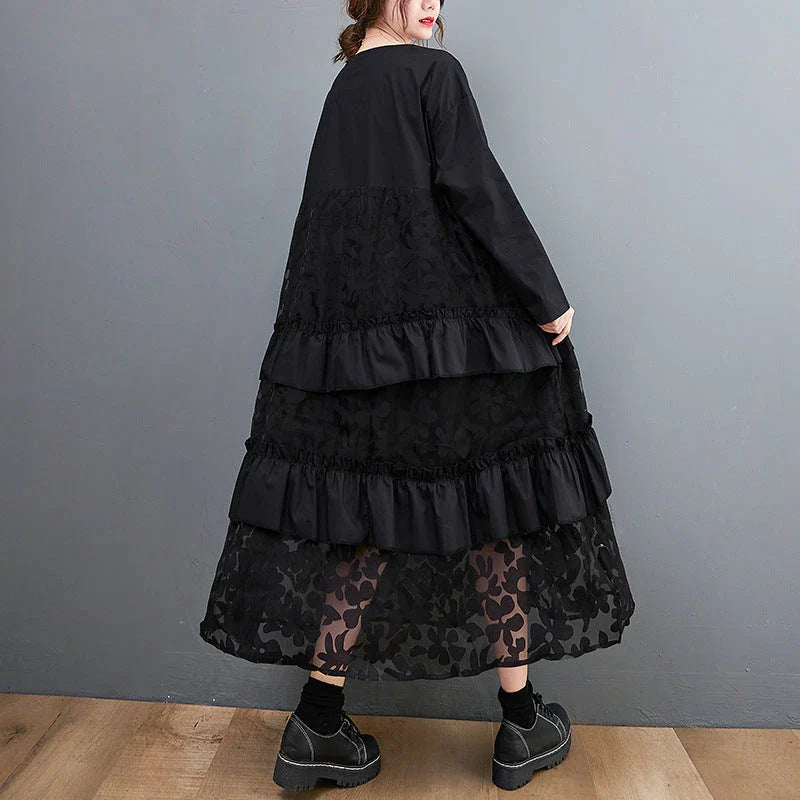 Stylish plus size dress in sophisticated black mesh fabric with wide waistline and long sleeves
