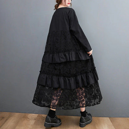 Stylish plus size dress in sophisticated black mesh fabric with wide waistline and long sleeves