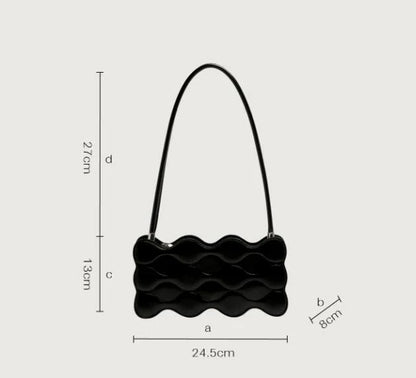 Premium embossed pearl chain handbag in fashionable shades with a soft, comfortable handle for hands-free carrying