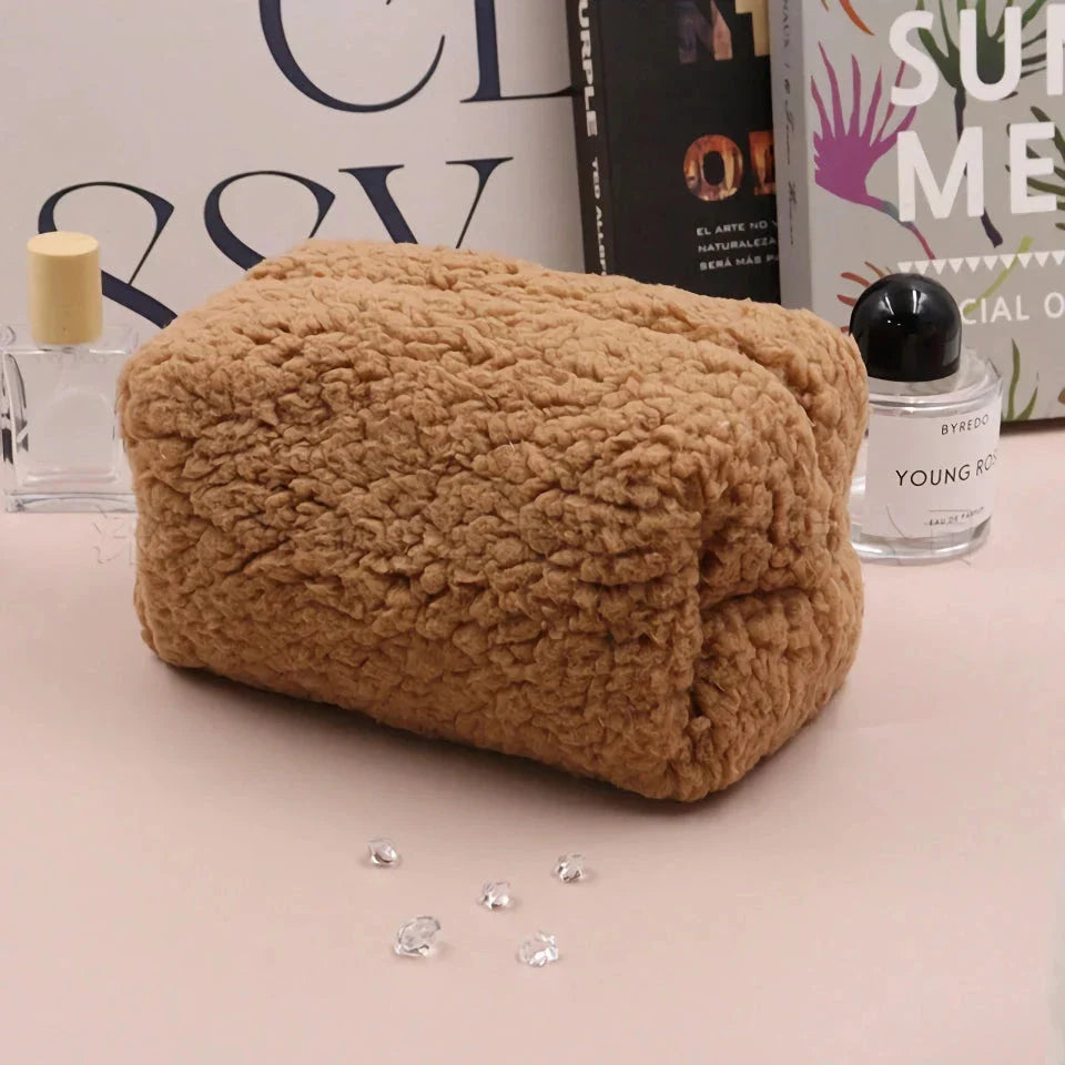 Plush lambswool exterior of the Luxurious Lambswool Multi-Purpose Cosmetic Bag in Khaki colour, with a robust zipper closure and spacious interior for organising makeup and other essentials.
