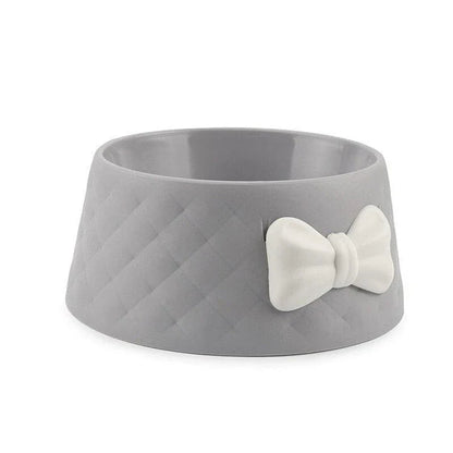 Stylish bowknot feeding bowl for pets, available in blue, grey, and pink colours