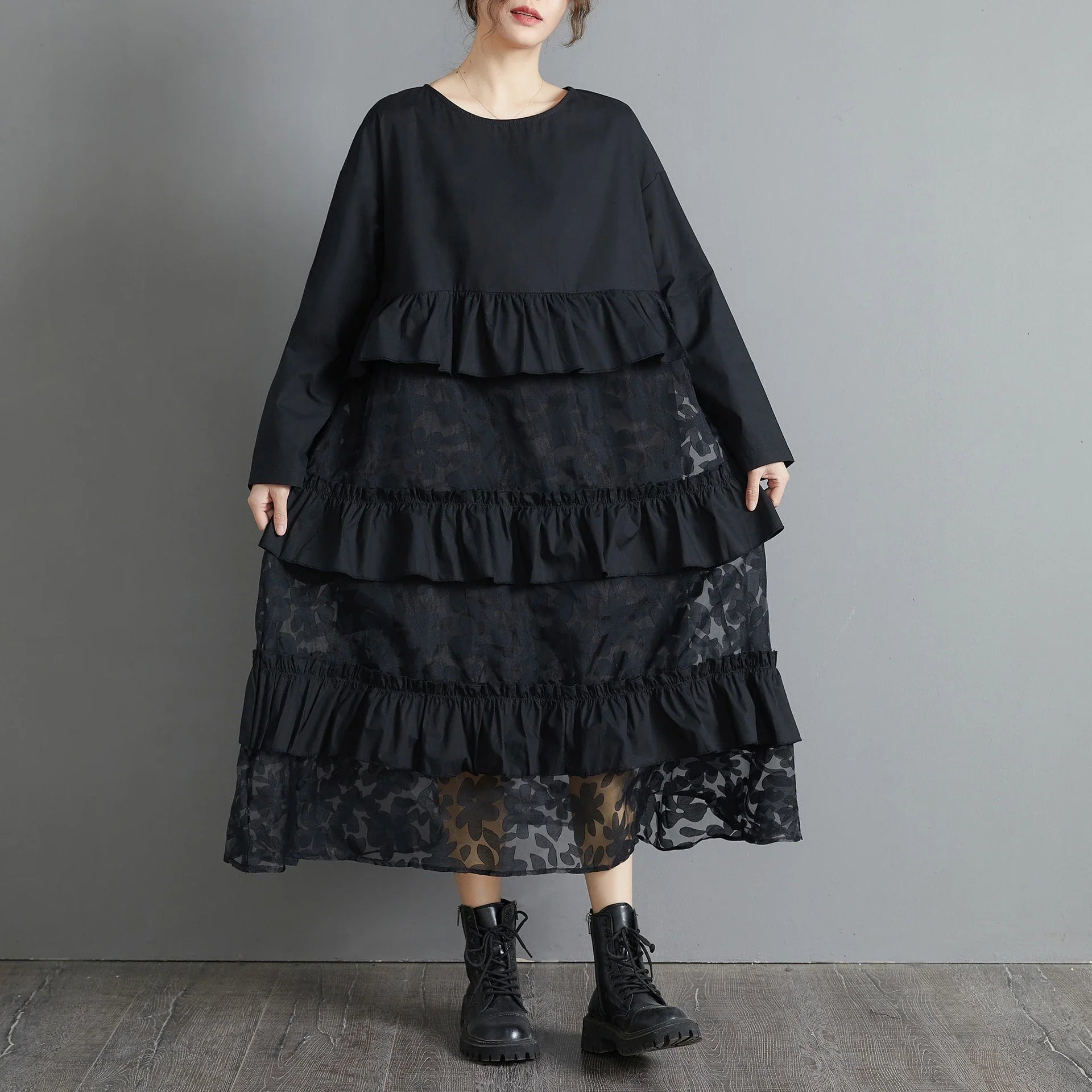 Plus size black lace dress with long sleeves and a loose, relaxed fit for a timeless and sophisticated look