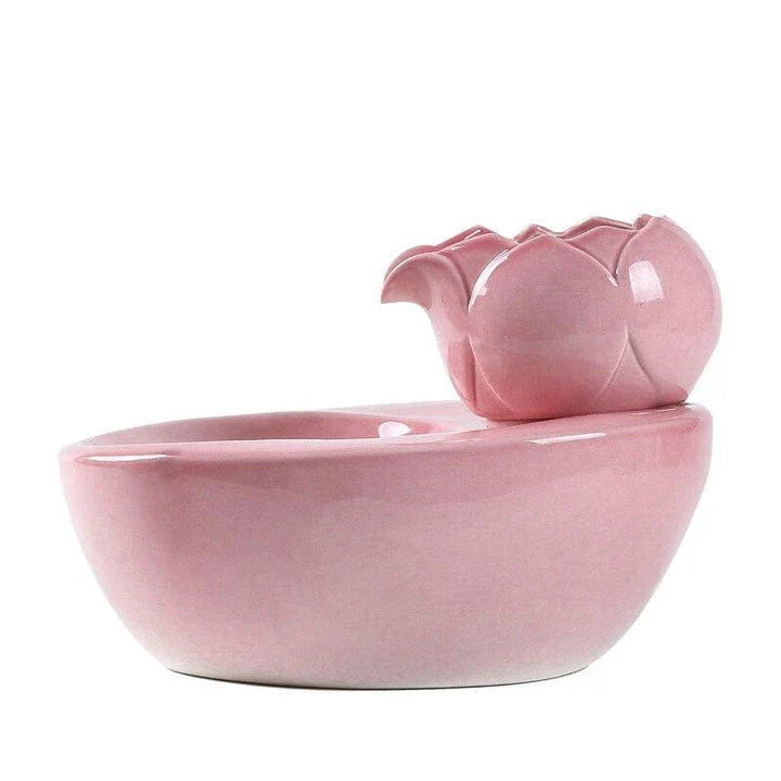 Elegant British-inspired ceramic drinking fountain with adjustable water flow and soothing ambiance