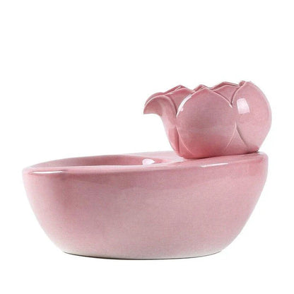 Elegant British-inspired ceramic drinking fountain with adjustable water flow and soothing ambiance