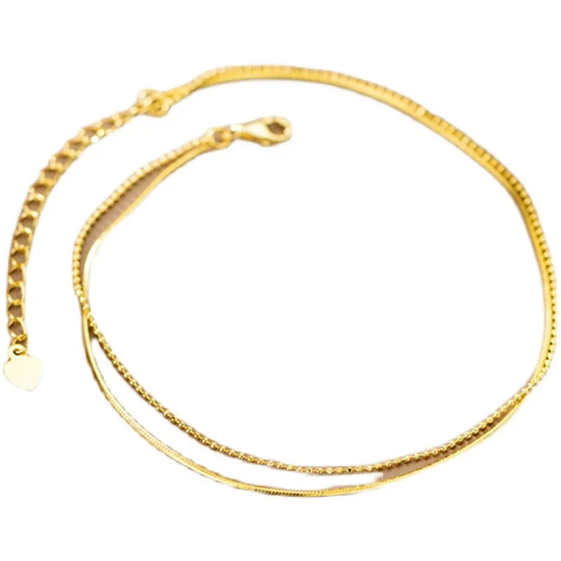 Elegant 14K gold-plated sterling silver anklet with intricate floral pattern and adjustable length