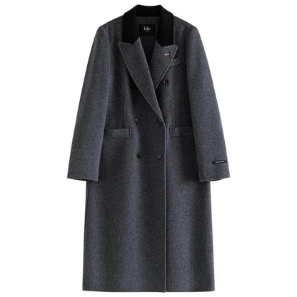 A sophisticated and stylish dark grey woollen coat for women, designed with a timeless double-breasted closure and notched collar.