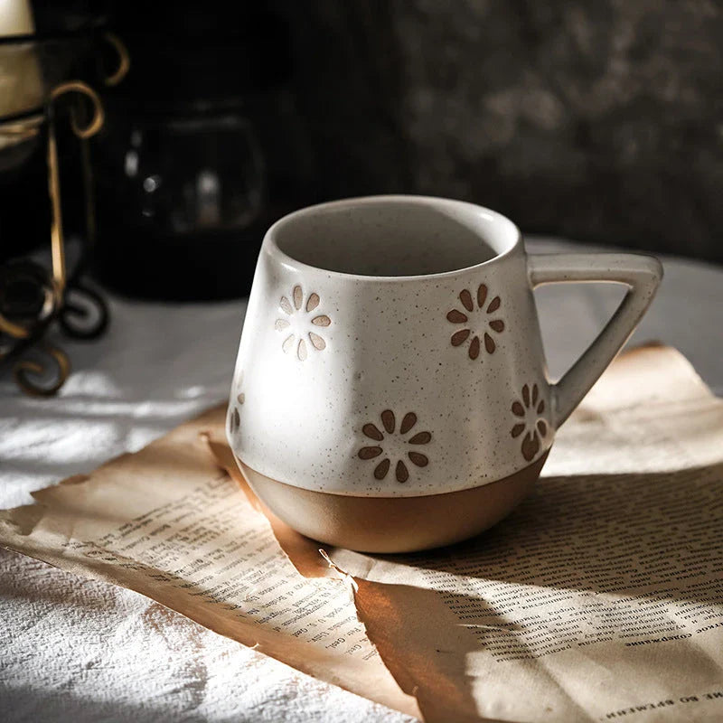 A hand-painted ceramic mug featuring a unique Nordic-inspired design, perfect for enjoying coffee, tea, or other beverages