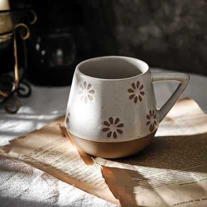 A hand-painted ceramic mug featuring a unique Nordic-inspired design, perfect for enjoying coffee, tea, or other beverages