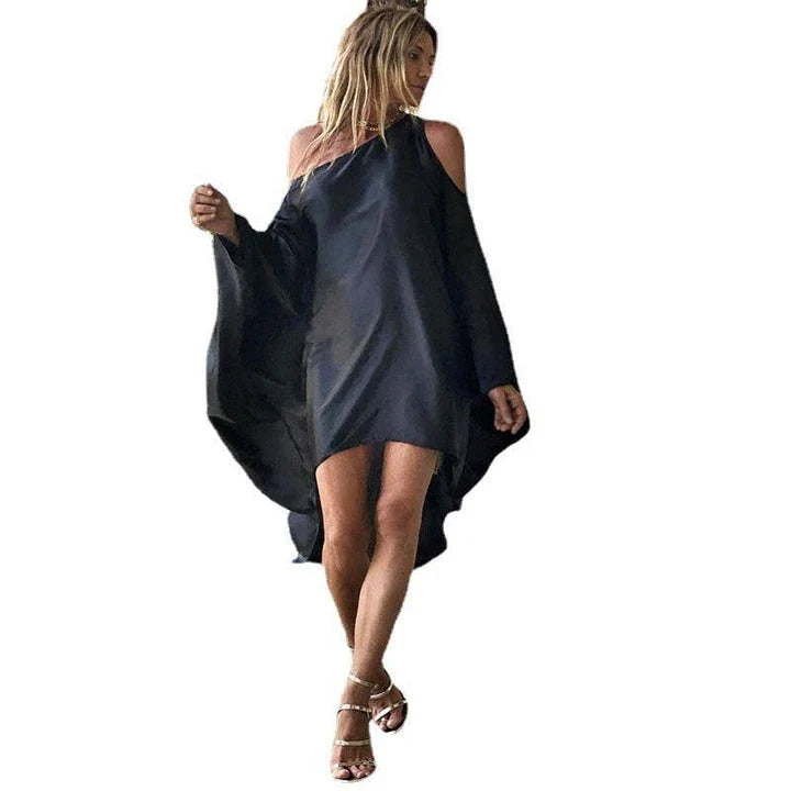 A chic inclined shoulder printed dress in a vibrant colour with a large, swinging skirt
