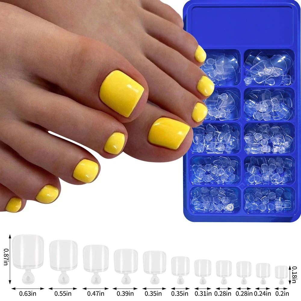Elegant short square press-on toenails in vibrant pink, red, and nude shades for a polished and convenient pedicure
