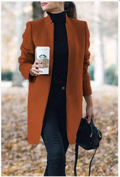 Premium British woollen coat with stand collar, featuring a sleek, slim-fit silhouette and subtle stitching details