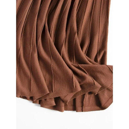Elegant mid-calf pleated wool skirt in a classic chocolate colour, perfect for the modern British woman's autumn and winter wardrobe.