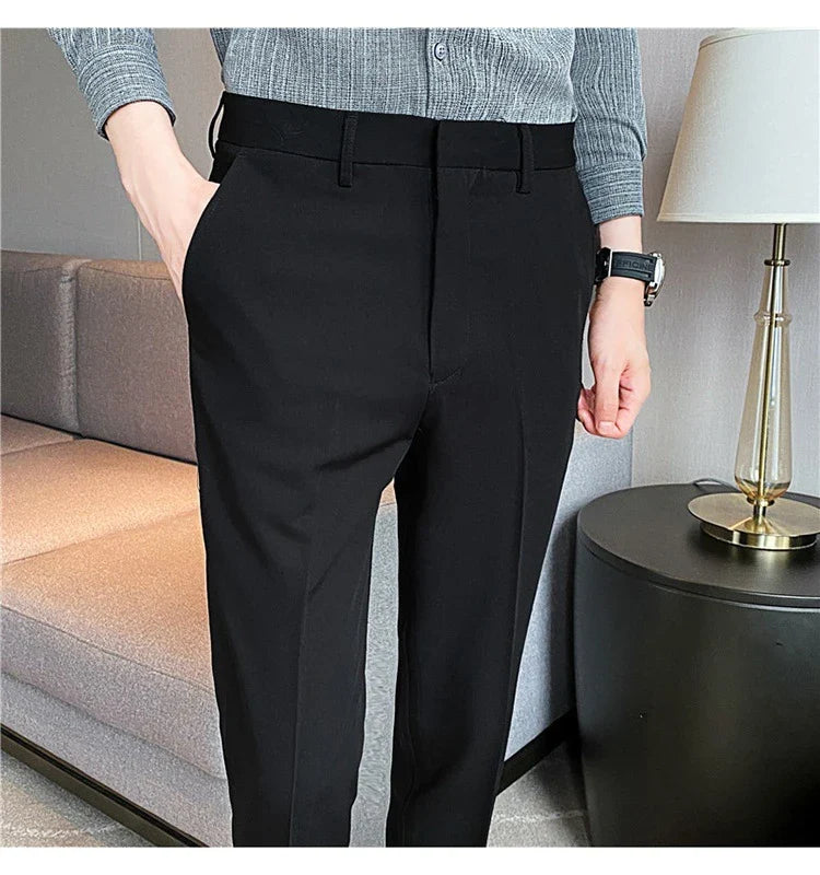 Premium men's suit trousers in a variety of colours, featuring a subtle textured drape and exceptional stretch for all-day comfort and style.