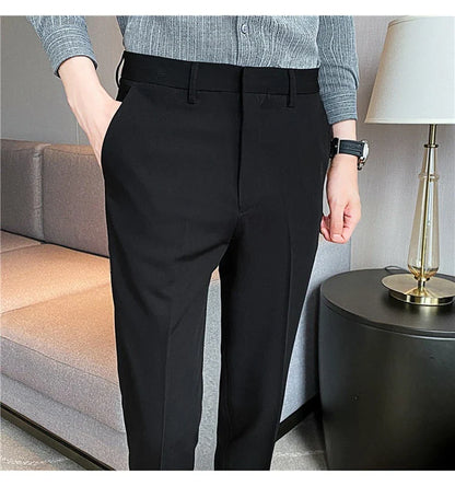 Premium men's suit trousers in a variety of colours, featuring a subtle textured drape and exceptional stretch for all-day comfort and style.