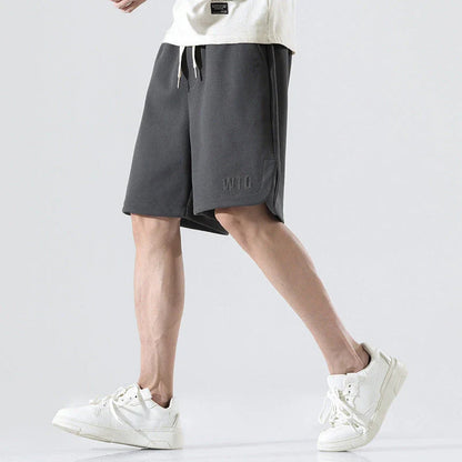 Premium British-made knitted sports shorts in a variety of classic colours, featuring an elastic waistband and loose, comfortable fit.