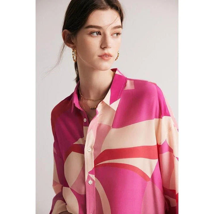 Elegant silk crepe de chine blouse in a unique print design, featuring a loose, straight fit and classic collar for a sophisticated yet comfortable look.