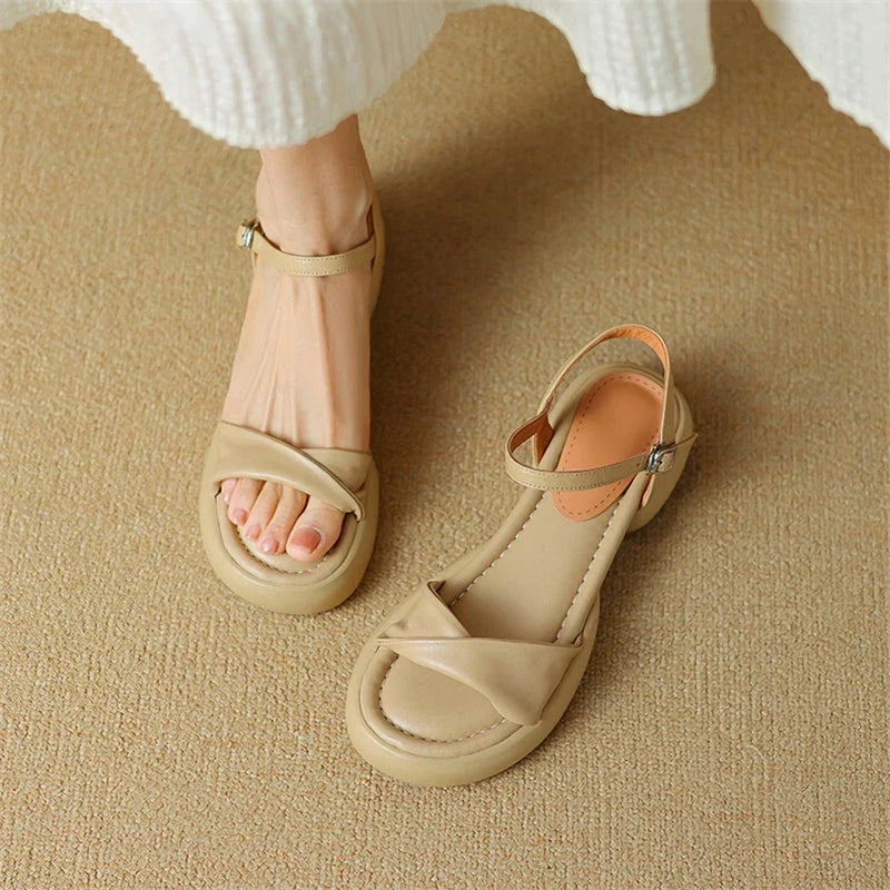 Premium leather chunky heel sandals in black with adjustable buckle strap for comfortable, stylish summer wear