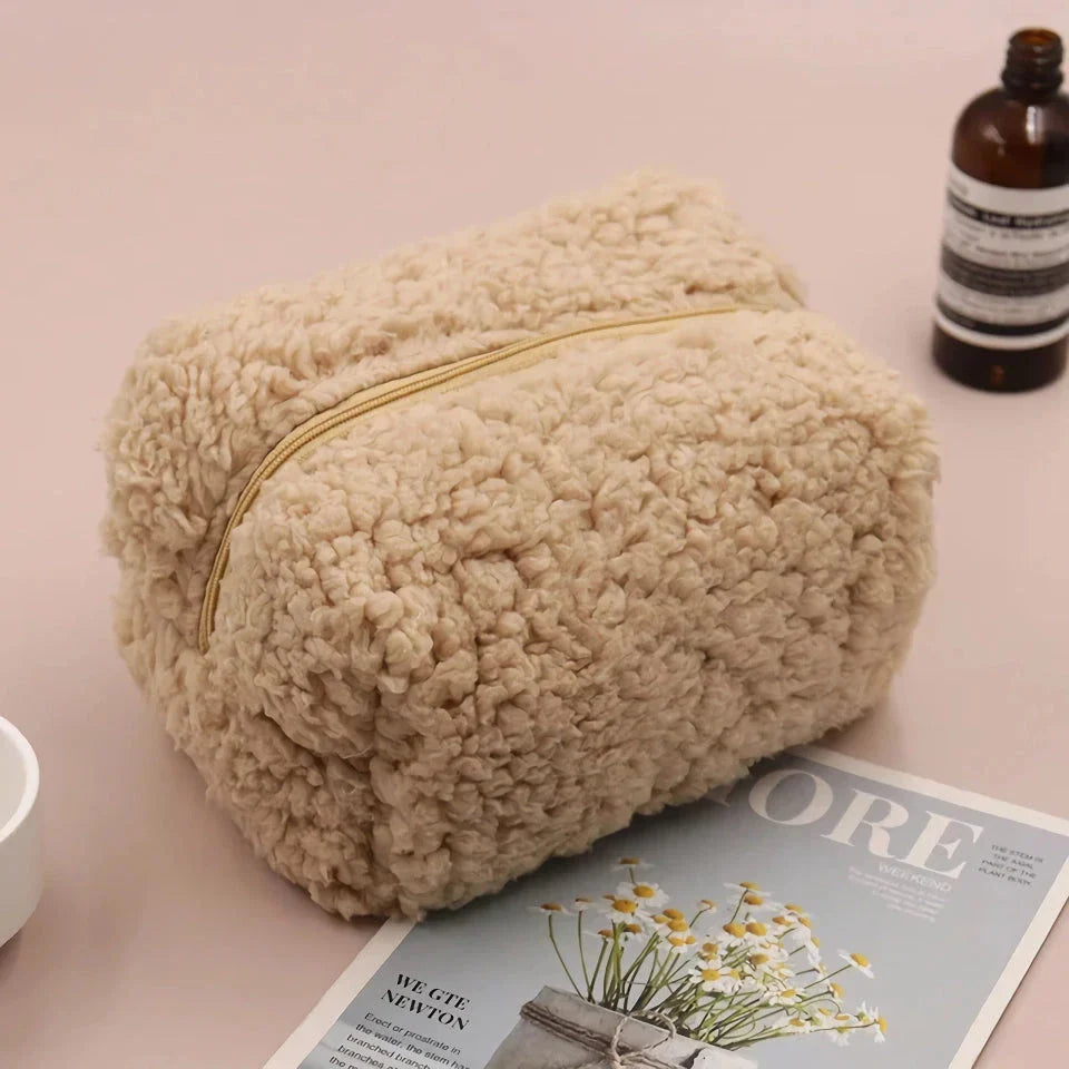 Plush lambswool exterior of the Luxurious Lambswool Multi-Purpose Cosmetic Bag in Khaki colour, with a robust zipper closure and spacious interior for organising makeup and other essentials.