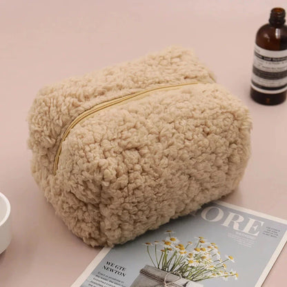 Plush lambswool exterior of the Luxurious Lambswool Multi-Purpose Cosmetic Bag in Khaki colour, with a robust zipper closure and spacious interior for organising makeup and other essentials.