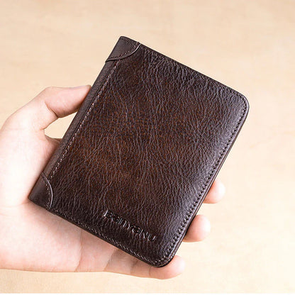 Premium men's short leather wallet with tri-fold design, made from top-grain cowhide leather for exceptional quality and style.