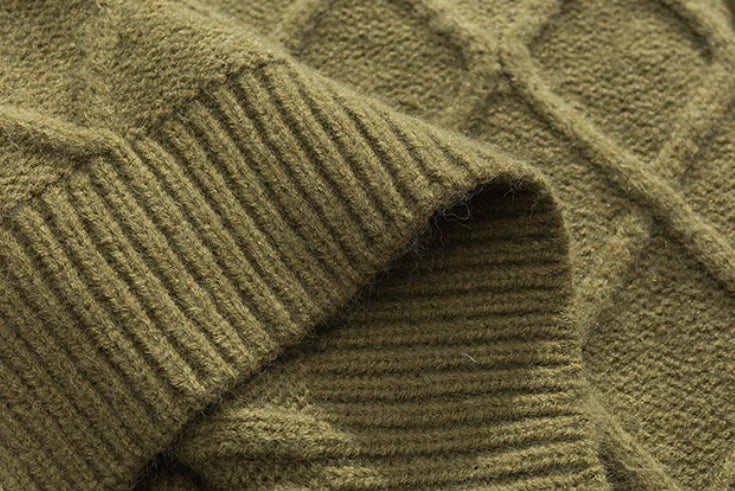 A premium men's knitted jumper in timeless colours, featuring a relaxed, flattering fit and soft, durable polyester fibre fabric for superior comfort and style.