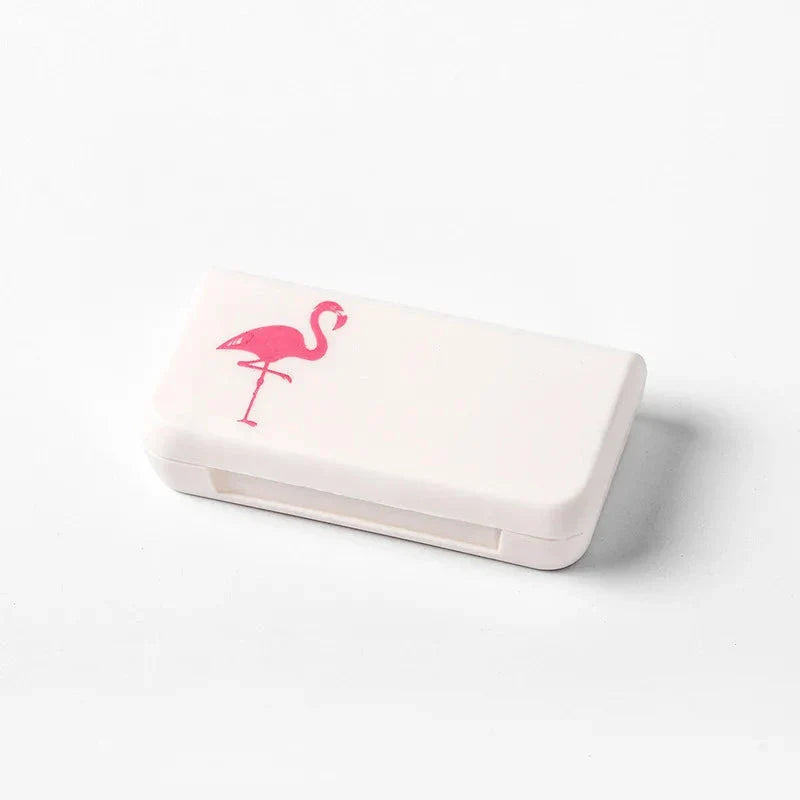 Compact and stylish 3-compartment pill organiser for travelling, made from durable, eco-friendly plastic