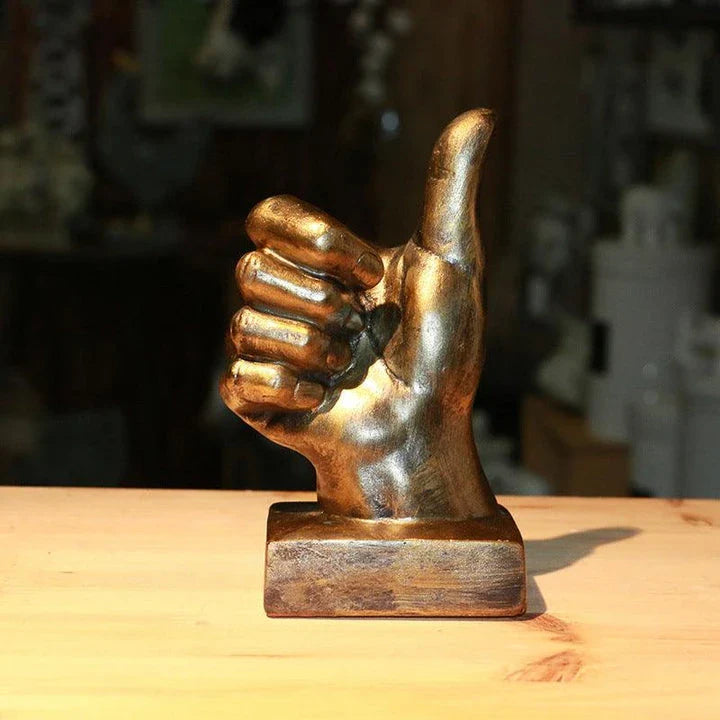 Elegant resin gesture ornaments in a variety of classic bronze and silver finishes, perfect for adding a charming accent to British-inspired home decor