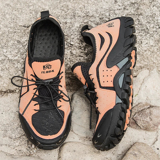 Couple wearing durable British-made mesh hiking shoes exploring the outdoors